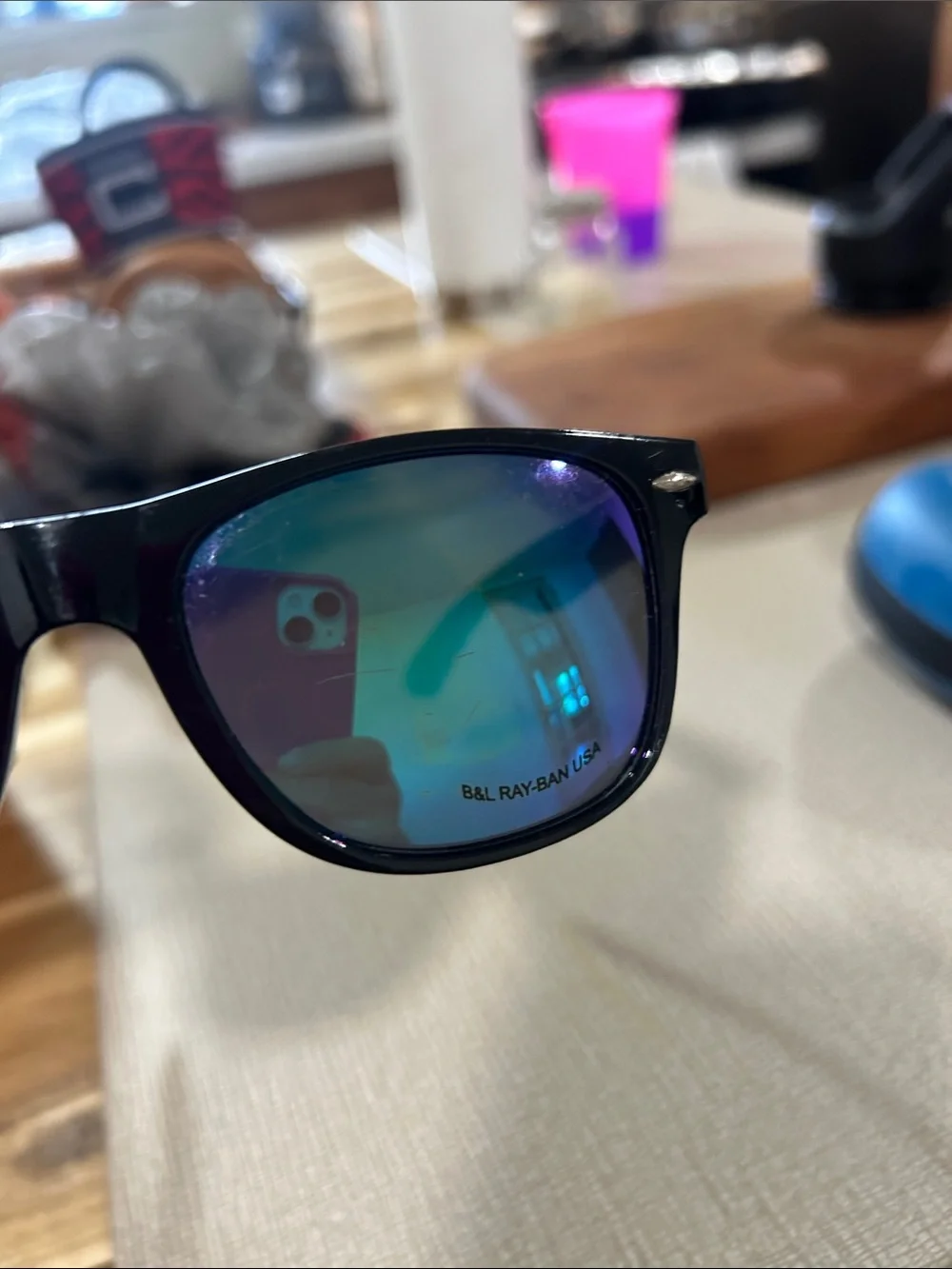 Ray-Ban Black Frame Sunglasses with Blue-Purple Mirrored Lenses